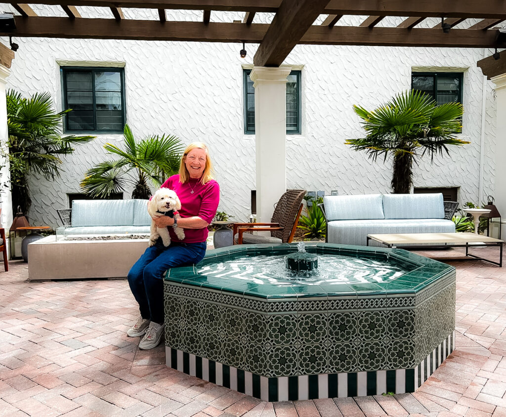 Author and her pup at the Patio and fountain at Mar Monte Hotel Santa Barbara