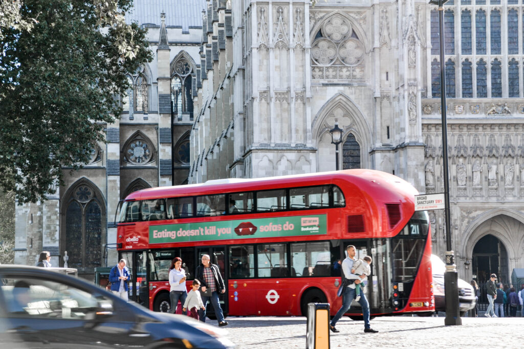 London street with red double decker bus