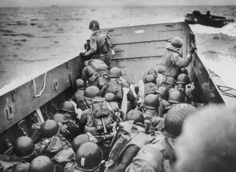 Allies on a boat on D-Day heading to the landing beaches